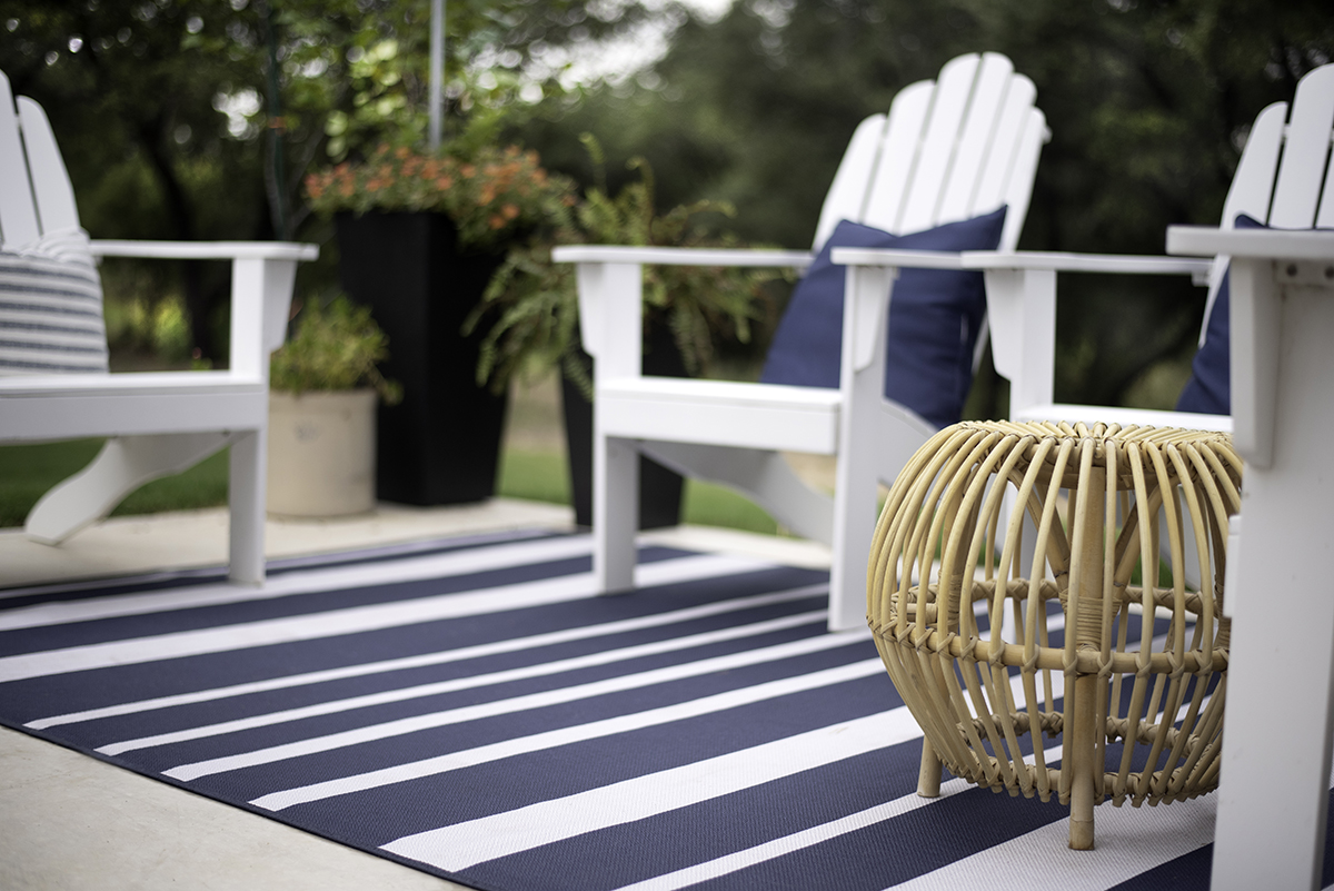 https://hamptonsrealestateshowcase.com/wp-content/uploads/2023/09/Ruggable-Outdoor-Sailmaker-Striped-Blue-2.jpg